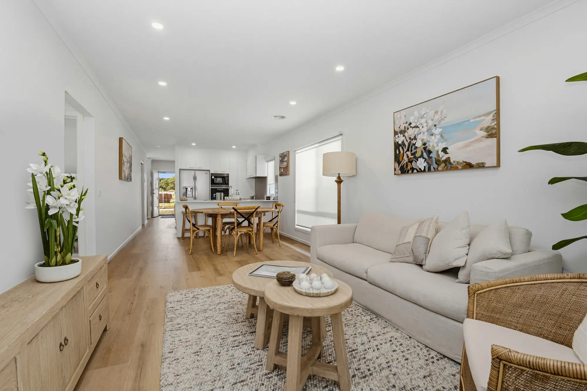 Open plan living and kitchen inside the Vital Bendigo display home